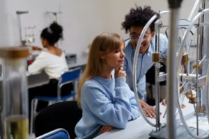 Students learning in the lab as they interact