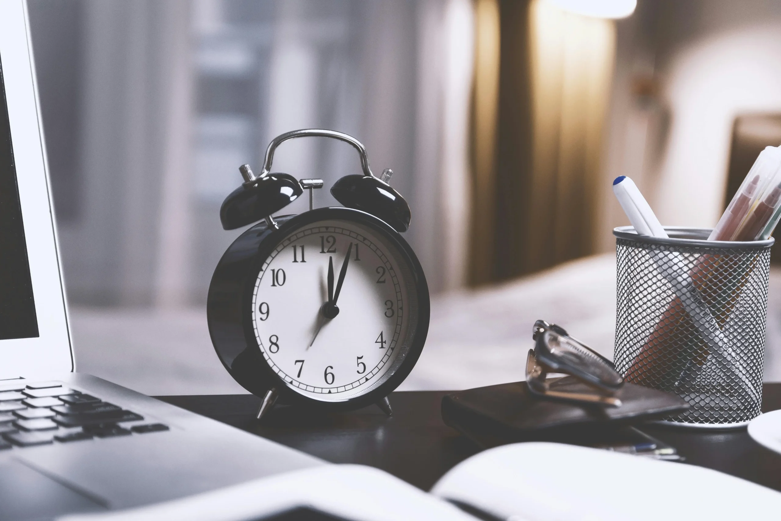 A clock on a workspace used to accurately manage time